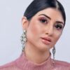 Iman - My Roial Ears LTD