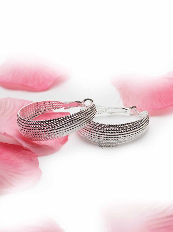 Annual- shell shaped silver earrings - My Roial Ears LTD